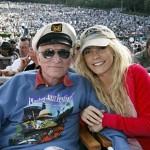 Hugh Hefner and Anna Berglund share a front row center box at the Playboy Jazz Festival in June in Los Angeles. (AP Photo/Reed Saxon)