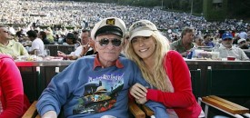 Hugh Hefner and Anna Berglund share a front row center box at the Playboy Jazz Festival in June in Los Angeles. (AP Photo/Reed Saxon)