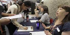 Students seek employment during a U. of I. job fair in Springfield. (AP/Seth Perlman)