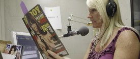 Suzi Hanks reads Playboy's articles -- and describes the pictures -- for Taping for the Blind in Houston. (AP)
