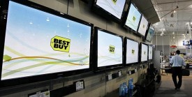 A customer shops for TVs at Best Buy. (AP Photo/Ron Heflin)