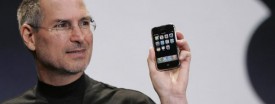 Apple CEO Steve Jobs showing off the first version of the iPhone in 2007. (AP Photo/Paul Sakuma)