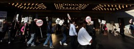 Hilton workers protest in front of the main entrance to the Hilton Hotel on Michigan Avenue in Chicago Saturday. (Tribune / Abel Uribe)