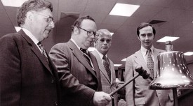 Edmund O'Connor, third from left, then CBOE's vice chairman, at bell-ringing ceremony to mark the opening of the CBOE's second trading floor in 1974. (Courtesy CBOE)