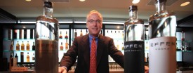 Bill Newlands, president of Beam Global Spirits & Wine, Inc., with one of Beam's newer brands, Effen Vodka, Aug 27, 2009. (Nancy Stone/Chicago Tribune)