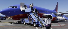 Passengers board a Southwest Airlines jet in Burbank, Calif. (AP Photo/Paul Sakuma)