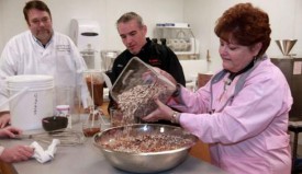 Chicagoan Diane Sroga whips up a batch of Bunches of Crunches for Baskin-Robbins chefs Stan Frankenthaler, left, and Kerry Burke. Sroga's creation will be Flavor of the Month in June.