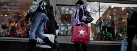 Shoppers on Chicago's Michigan Avenue in December of 2010. Retailers in the U.S. could get hit hard by rising clothing prices. (Zbigniew Bzdak/Chicago Tribune)