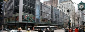 Pedestrians pass Block 37, the star-crossed shopping center in the Loop, which was sold at a sheriff's auction Wednesday to Bank of America for $100 million. (Antonio Perez/Tribune)