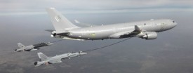 An Airbus A330 Multi Role Tanker Transport is shown while refueling two probe-equipped F/A-18 fighter aircraft in this handout photograph from November 2009. (Reuters/EADS North America/Handout)