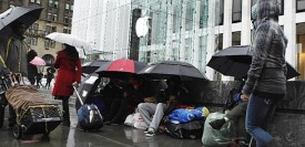 Customers line up Thursday in New York to buy an iPad 2. (Reuters/Lucas Jackson)