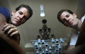 At their Olympic rowing team house in Chula Vista, Calf., Tyler Winkelvoss, left and his identical twin brother Cameron Winklevoss. (Don Bartletti / Los Angeles Times)